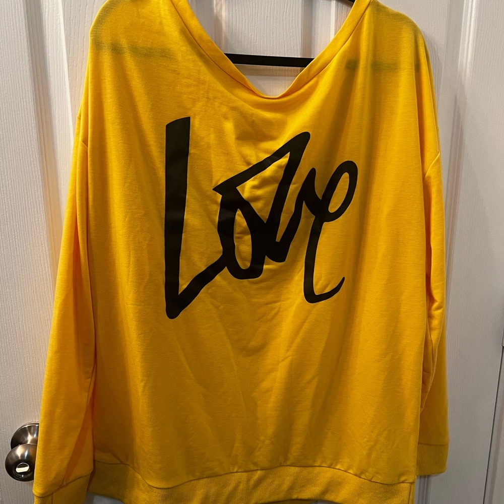 Woman’s off the shoulder sweatshirt